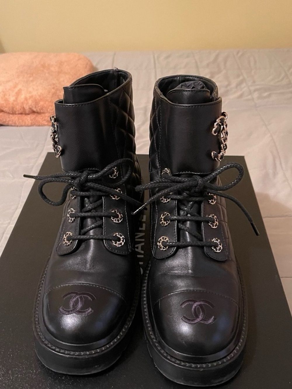 CHANEL Black Quilted Leather Lace-Up Combat Boots with Chain Trim